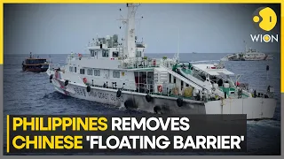 Philippines removes Chinese 'floating barrier' in contested Shoal area | World News | WION