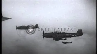 US Navy TBF Avenger torpedo bombers take off from USS Essex (CV-9) and fly over E...HD Stock Footage