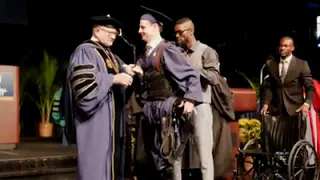 PARALYZED STUDENT WALKS ON GRADUATION