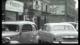 Liverpool City Police Recruitment Film (1958) in the background John Lennon and Paul McCartney