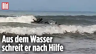 Fast ertrunken: Menschenkette rettet Schwimmer | Philippinen