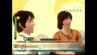 the exact moment I got the platinum trophy for The Beatles Rock Band