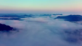 4K 100% Royalty-Free Stock Footage | aerial view of mountains and clouds | No Copyright Video