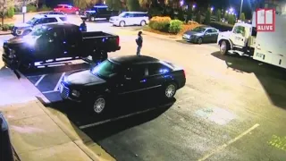 Video shows officer run over by fleeing suspects in Fairburn, Ga.