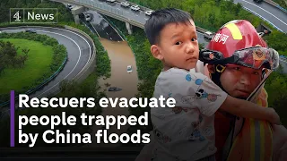 China floods: Death toll rises after record rainfall traps commuters in underground rail tunnels