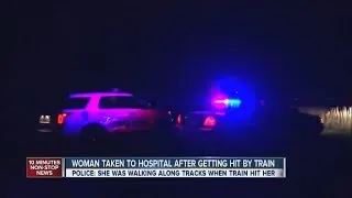 Woman walking on tracks at night hit by train