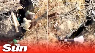 Russian soldiers run through trenches as Ukrainian drones bombard them