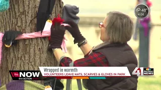 Scarves, gloves, & hats wrapped around Washington Square Park for homeless