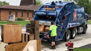 Republic Rear Loader Garbage Truck Packing Massive Wood Furniture Pile