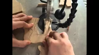 Scroll saw cutting a unicorn