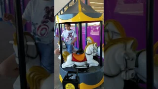 1970's Mini carousel kiddie ride (Gray and yellow; Horses and donkies)