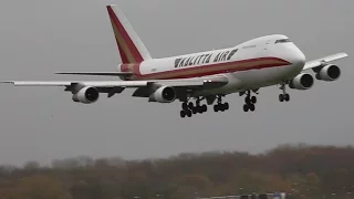Classic Boeing B747-200 struggles to the tarmac in rocking approach.
