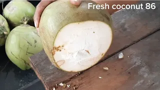 Cutting fresh coconut 12.