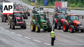 French and Spanish farmers block road on both sides of border in protest of EU policy