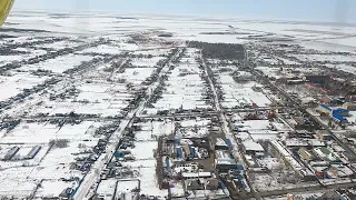 Пролёт над Спасском-Дальним и посадка на поле.