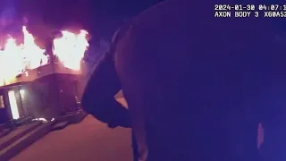Bodycam shows dramatic rescue from house fire
