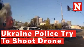 Bodycam Video Shows Ukraine Police Shooting Down Drone Before Explosion