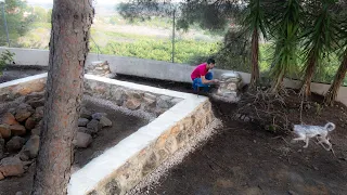 Building Stone Pillars for the Terrace of the Log Cabin