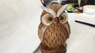 Painting A Brown Owl Garden Ornament