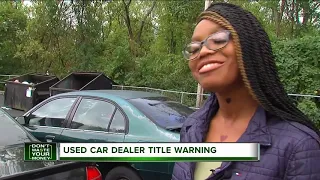 Used car dealer title warning