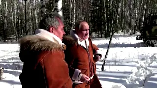 Putin takes defense minister for a ride in Siberia