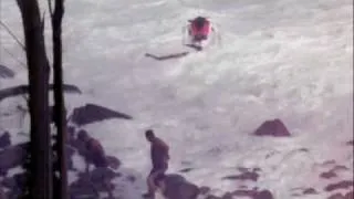 Jetski at Jaws gets rocked and almost knocks out two guys.m4v