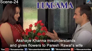 Akshaye Khanna misunderstands and gives flowers to Paresh Rawal's wife (Hungama)