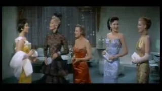 Dolores Gray wears triple bouffant dress in "The Opposite Sex"