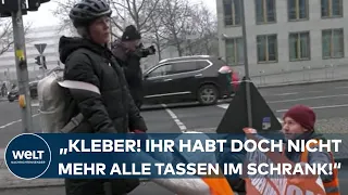 BERLIN: "Kleber! Ihr habt doch nicht mehr alle Tassen im Schrank!" Aktivisten sorgen für Ärger