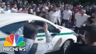 Taxi and Uber drivers clash at Cancun airport
