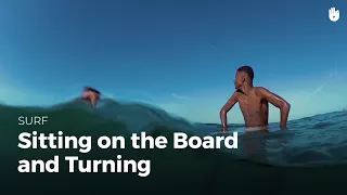 Sitting on the board and turning | Surf