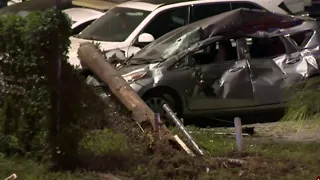 Car crashes through utility pole, rolls over following police chase on North Side