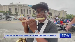 Despite the rainout, Mets and Yankees fans have fun