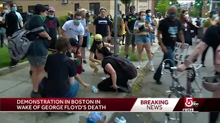 Chaos, clashes between police, protesters outside Boston precinct