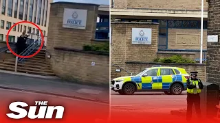 Moment gunman storms Bradford police station and opens fire