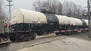 Norfolk Southern Mixed freight, with empty hoppers, North Kingsville, Ohio.