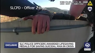 Body cam video shows police officers save man's life during mental health crisis