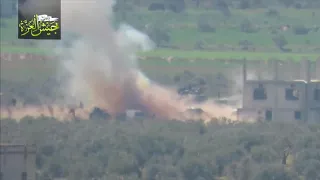 FSA fighters fire a TOW missile into a group of at least 40 Pro Assad infantrymen.