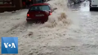 Driver Swept Away by Floodwaters in Spain  | VOA News