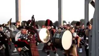 slow march massed pipes and drums, John Frost bridge, Arnhem.