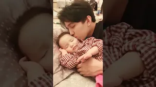 Dimash kisses cute baby