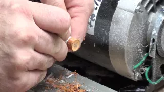 Replacing a cue tip using a Cue lathe