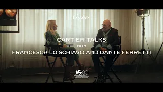 Cartier talks with Francesca Lo Schiavo and Dante Ferretti at the Venice International Film Festival