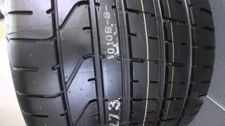 How wide are the Lamborghini Aventador's rear tires?