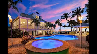 Experience Unparalleled Luxury at Pineapple Beach: 5-Bedroom Oceanfront Estate in Islamorada.