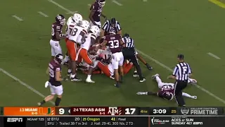 Texas A&M player plays dead after getting pulled off pile