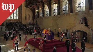 Biden visits queen's coffin at Westminster