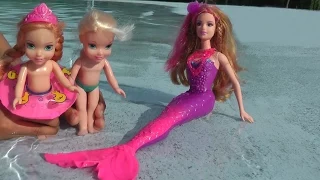 Elsa and Anna toddlers take swimming lessons from Romy the mermaid. Huge Pool