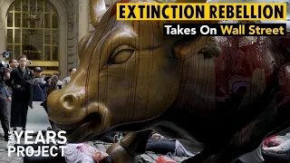 Extinction Rebellion NYC Takes A Stand At Wall Street's Charging Bull