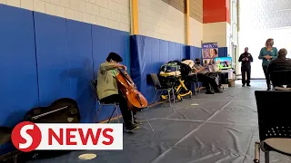 Cellist Yo-Yo Ma transforms vaccine waiting area into impromptu concert
